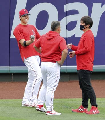 Baseball: Angels Ohtani Shohei Ohtani (L) of the Los Angeles Angels smiles before a game against the Kansas City Royals at Angel Stadium in Anaheim, California, on June 7, 2021. 