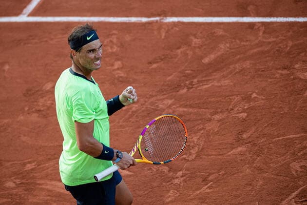 (210608) -- PARIS, June 8, 2021 -- Rafael Nadal of Spain celebrates during the men s singles fourth round match between Rafael Nadal of Spain and Jannik Sinner of Italy at the French Open tennis tournament at Roland Garros in Paris, France, June 7, 2021. (Photo by Xinhua) (SP)FRANCE-PARIS-TENNIS-ROLAND GARROS-FRENCH OPEN-DAY 9 AurelienxMorissard 