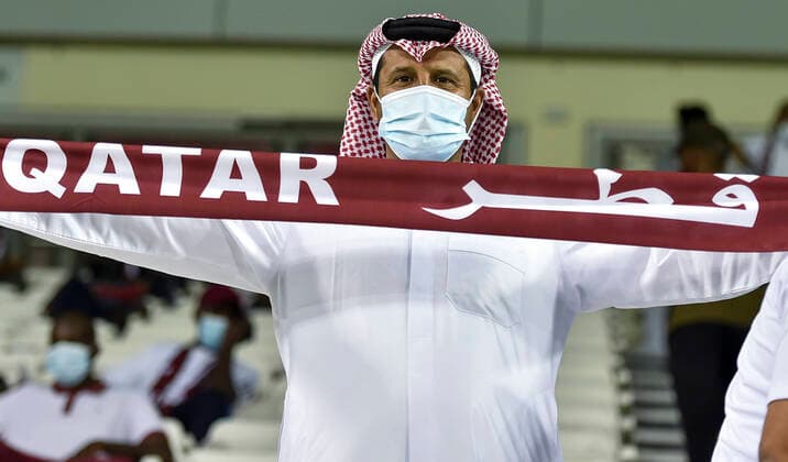 (210608) -- DOHA, June 8, 2021 -- A Qatari fan cheers for the team prior to the second round Group E football match between Qatar and Oman at FIFA World Cup, WM, Weltmeisterschaft, Fussball Qatar 2022 and AFC Asian Cup China 2023 Preliminary Joint Qualification in Doha, Qatar, on June 7, 2021. (Photo by Nikku Xinhua) (SP)QATAR-DOHA-FOOTBALL-2022 FIFA WORLD CUP QUALIFIER-GROUP E-QAT VS OMN (CN) yangyuanyong 