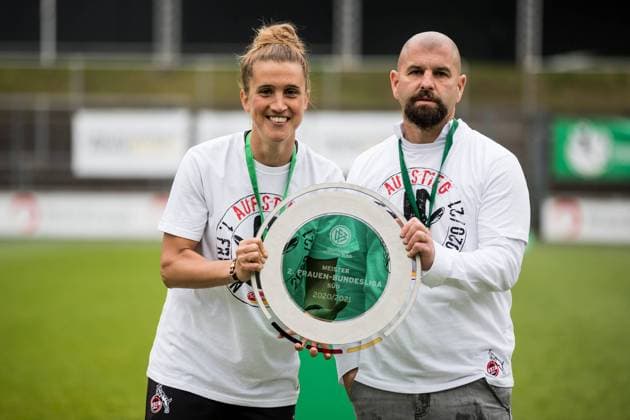 2 Frauen Fussball Bundesliga, 1 FC Koeln SG 99 Andernach 06 06 2021 Mirella Junker Co Trainer 1 FC Koeln and Sascha Glass Trainer 1 FC Koeln with the championship trophy 2 Frauen Fussball Bundesliga, 1 FC Koeln SG 99 Andernach, Koeln, Franz Kremer Stadion DFL REGULATIONS PROHIBIT ANY USE OF PHOTOGRAPHS AS IMAGE SEQUENCES AND OR QUASI VIDEO Copyright: xBEAUTIFULxSPORTS Wunderlx