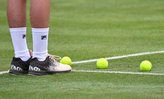 Feature Tennis balls on grass FILA socks 08 06 2021 Tennis MercedesCup Stuttgart 2021 Weißenhof ATP 07 13 06 2021 Tennis MercedesCup Stuttgart 2021
