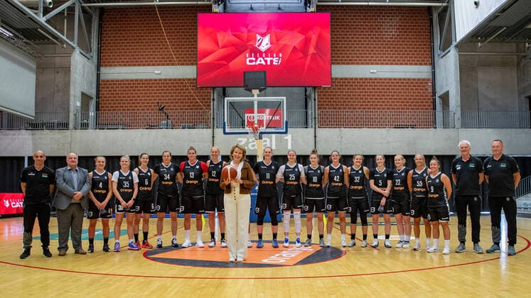 Queen Mathilde of Belgium and Belgian Cats players and staff pose for a group picture during a royal visit to the Belgian Cats, the Belgian national women s basketball team, in Kortrijk, Tuesday 08 June 2021. The Belgian Cats are participating in the Olympic Games, Olympische Spiele, Olympia, OS in Tokyo. After a round table discussion, the Queen will attend a training session and have a conversation with the basketball players at the Lange Munte sports campus in Kortrijk. KURTxDESPLENTER  x2809250x