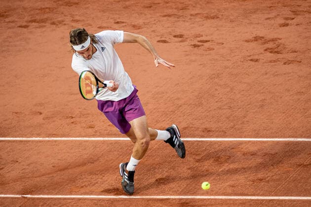 (210609) -- PARIS, June 9, 2021 -- Stefanos Tsitsipas of Greece returns the ball during the men s singles quarterfinal match between Stefanos Tsitsipas of Greece and Daniil Medvedev of Russia at the French Open tennis tournament at Roland Garros in Paris, France, June 8, 2021. (Photo by Xinhua) (SP)FRANCE-PARIS-TENNIS-ROLAND GARROS-FRENCH OPEN-MEN S SINGLES-DAY 10 AurelienxMorissard 