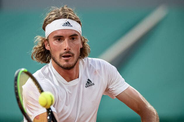 (210609) -- PARIS, June 9, 2021 -- Stefanos Tsitsipas of Greece returns the ball during the men s singles quarterfinal match between Stefanos Tsitsipas of Greece and Daniil Medvedev of Russia at the French Open tennis tournament at Roland Garros in Paris, France, June 8, 2021. (Photo by Xinhua) (SP)FRANCE-PARIS-TENNIS-ROLAND GARROS-FRENCH OPEN-MEN S SINGLES-DAY 10 AurelienxMorissard 