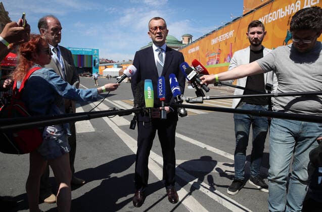 ST PETERSBURG, RUSSIA â€“ JUNE 9, 2021: St Petersburg Vice Governor Boris Piotrovsky (C) talks to the media at a football village in Konyushennaya Square ahead of the UEFA EURO, EM, Europameisterschaft,Fussball 2020 Championship. Entry to the fan zone is free and does not require a Fan-ID or a negative PCR test for coronavirus; no more than 5 thousand people will be allowed in. Alexander Demianchuk TASS  TS104213