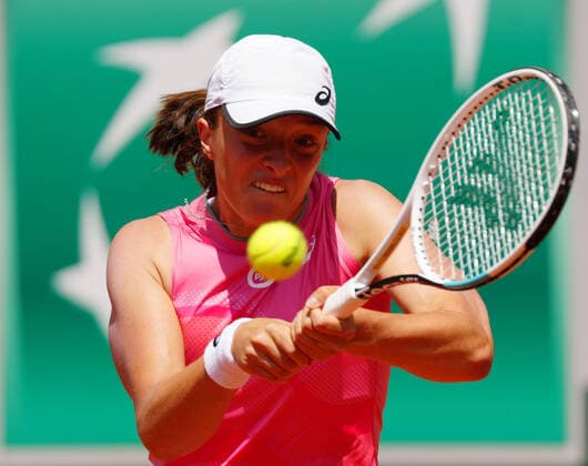 (210609) -- PARIS, June 9, 2021 -- Iga Swiatek of Poland returns the ball during the women s singles quarterfinal match between Maria Sakkari of Greece and Iga Swiatek of Poland at the French Open tennis tournament at Roland Garros in Paris, France, June 9, 2021. ) (SP)FRANCE-PARIS-TENNIS-ROLAND GARROS-FRENCH OPEN-WOMEN S SINGLES GaoxJing 