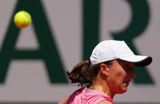 (210609) -- PARIS, June 9, 2021 -- Iga Swiatek of Poland reacts during the women s singles quarterfinal match between Maria Sakkari of Greece and Iga Swiatek of Poland at the French Open tennis tournament at Roland Garros in Paris, France, June 9, 2021. ) (SP)FRANCE-PARIS-TENNIS-ROLAND GARROS-FRENCH OPEN-WOMEN S SINGLES GaoxJing 
