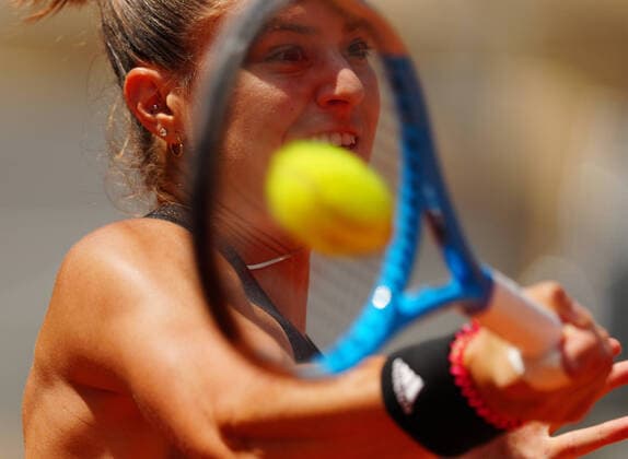 (210609) -- PARIS, June 9, 2021 -- Maria Sakkari of Greece returns the ball during the women s singles quarterfinal match between Maria Sakkari of Greece and Iga Swiatek of Poland at the French Open tennis tournament at Roland Garros in Paris, France, June 9, 2021. ) (SP)FRANCE-PARIS-TENNIS-ROLAND GARROS-FRENCH OPEN-WOMEN S SINGLES GaoxJing 