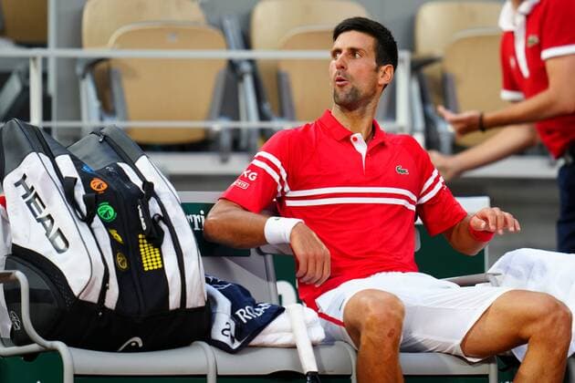 Mandatory Credit: Photo by Javier Garcia BPI Shutterstock (12046068lb) Novak Djokovic reacts to boos against him during his quarter final French Open Tennis, Day Eleven, Roland Garros, Paris, France - 09 Jun 2021 French Open Tennis, Day Eleven, Roland Garros, Paris, France - 09 Jun 2021  Copyright: xJavierxGarcia BPI Shutterstockx 12046068lb
