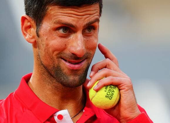 Mandatory Credit: Photo by Javier Garcia BPI Shutterstock (12046068lg) Novak Djokovic reacts to boos against him during his quarter final French Open Tennis, Day Eleven, Roland Garros, Paris, France - 09 Jun 2021 French Open Tennis, Day Eleven, Roland Garros, Paris, France - 09 Jun 2021  Copyright: xJavierxGarcia BPI Shutterstockx 12046068lg