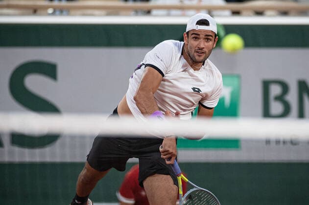 (210610) -- PARIS, June 10, 2021 -- Matteo Berrettini of Italy hits a return during the men s singles quarterfinal against Novak Djokovic of Serbia at the French Open tennis tournament at Roland Garros in Paris, France, June 9, 2021. (Photo by Xinhua) (SP)FRANCE-PARIS-TENNIS-ROLAND GARROS-FRENCH OPEN-MEN S SINGLES-DAY 11 AurelienxMorissard 