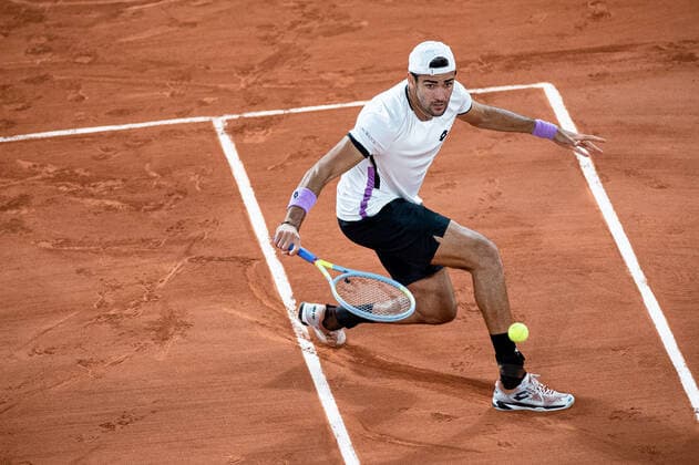 (210610) -- PARIS, June 10, 2021 -- Matteo Berrettini of Italy hits a return during the men s singles quarterfinal against Novak Djokovic of Serbia at the French Open tennis tournament at Roland Garros in Paris, France, June 9, 2021. (Photo by Xinhua) (SP)FRANCE-PARIS-TENNIS-ROLAND GARROS-FRENCH OPEN-MEN S SINGLES-DAY 11 AurelienxMorissard 