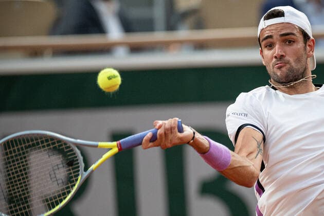 (210610) -- PARIS, June 10, 2021 -- Matteo Berrettini of Italy hits a return during the men s singles quarterfinal against Novak Djokovic of Serbia at the French Open tennis tournament at Roland Garros in Paris, France, June 9, 2021. (Photo by Xinhua) (SP)FRANCE-PARIS-TENNIS-ROLAND GARROS-FRENCH OPEN-MEN S SINGLES-DAY 11 AurelienxMorissard 