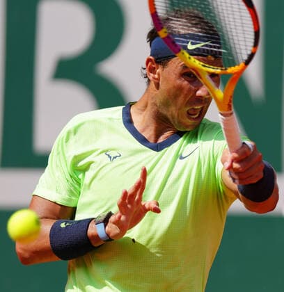 (210610) -- PARIS, June 10, 2021 -- Rafael Nadal of Spain hits a return during the men s singles quarterfinal against Diego Schwartzman of Argentina at the French Open tennis tournament at Roland Garros in Paris, France, June 9, 2021. ) (SP)FRANCE-PARIS-TENNIS-ROLAND GARROS-FRENCH OPEN-MEN S SINGLES-DAY 11 GaoxJing 