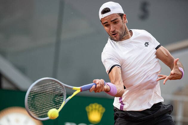 (210610) -- PARIS, June 10, 2021 -- Matteo Berrettini of Italy hits a return during the men s singles quarterfinal against Novak Djokovic of Serbia at the French Open tennis tournament at Roland Garros in Paris, France, June 9, 2021. (Photo by Xinhua) (SP)FRANCE-PARIS-TENNIS-ROLAND GARROS-FRENCH OPEN-MEN S SINGLES-DAY 11 AurelienxMorissard 