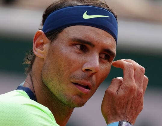 (210610) -- PARIS, June 10, 2021 -- Rafael Nadal of Spain reacts during the men s singles quarterfinal against Diego Schwartzman of Argentina at the French Open tennis tournament at Roland Garros in Paris, France, June 9, 2021. ) (SP)FRANCE-PARIS-TENNIS-ROLAND GARROS-FRENCH OPEN-MEN S SINGLES-DAY 11 GaoxJing 