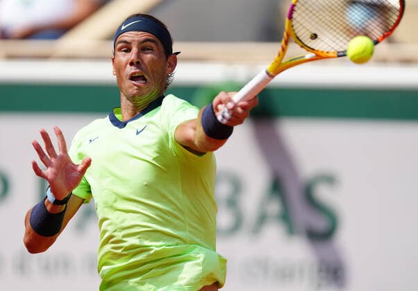 (210610) -- PARIS, June 10, 2021 -- Rafael Nadal of Spain hits a return during the men s singles quarterfinal against Diego Schwartzman of Argentina at the French Open tennis tournament at Roland Garros in Paris, France, June 9, 2021. ) (SP)FRANCE-PARIS-TENNIS-ROLAND GARROS-FRENCH OPEN-MEN S SINGLES-DAY 11 GaoxJing 