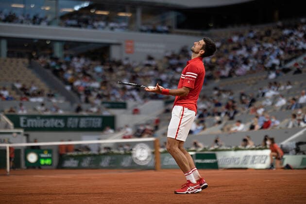 (210610) -- PARIS, June 10, 2021 -- Novak Djokovic of Serbia reacts during the men s singles quarterfinal against Matteo Berrettini of Italy at the French Open tennis tournament at Roland Garros in Paris, France, June 9, 2021. (Photo by Xinhua) (SP)FRANCE-PARIS-TENNIS-ROLAND GARROS-FRENCH OPEN-MEN S SINGLES-DAY 11 AurelienxMorissard 