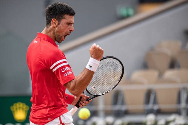 (210610) -- PARIS, June 10, 2021 -- Novak Djokovic of Serbia reacts during the men s singles quarterfinal against Matteo Berrettini of Italy at the French Open tennis tournament at Roland Garros in Paris, France, June 9, 2021. (Photo by Xinhua) (SP)FRANCE-PARIS-TENNIS-ROLAND GARROS-FRENCH OPEN-MEN S SINGLES-DAY 11 AurelienxMorissard 