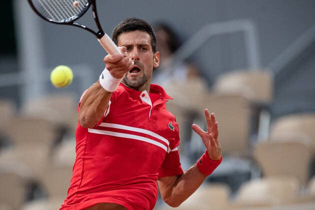 (210610) -- PARIS, June 10, 2021 -- Novak Djokovic of Serbia hits a return during the men s singles quarterfinal against Matteo Berrettini of Italy at the French Open tennis tournament at Roland Garros in Paris, France, June 9, 2021. (Photo by Xinhua) (SP)FRANCE-PARIS-TENNIS-ROLAND GARROS-FRENCH OPEN-MEN S SINGLES-DAY 11 AurelienxMorissard 