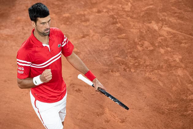 (210610) -- PARIS, June 10, 2021 -- Novak Djokovic of Serbia reacts during the men s singles quarterfinal against Matteo Berrettini of Italy at the French Open tennis tournament at Roland Garros in Paris, France, June 9, 2021. (Photo by Xinhua) (SP)FRANCE-PARIS-TENNIS-ROLAND GARROS-FRENCH OPEN-MEN S SINGLES-DAY 11 AurelienxMorissard 