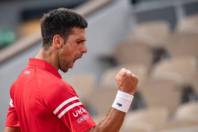 (210610) -- PARIS, June 10, 2021 -- Novak Djokovic of Serbia reacts during the men s singles quarterfinal against Matteo Berrettini of Italy at the French Open tennis tournament at Roland Garros in Paris, France, June 9, 2021. (Photo by Xinhua) (SP)FRANCE-PARIS-TENNIS-ROLAND GARROS-FRENCH OPEN-MEN S SINGLES-DAY 11 AurelienxMorissard 
