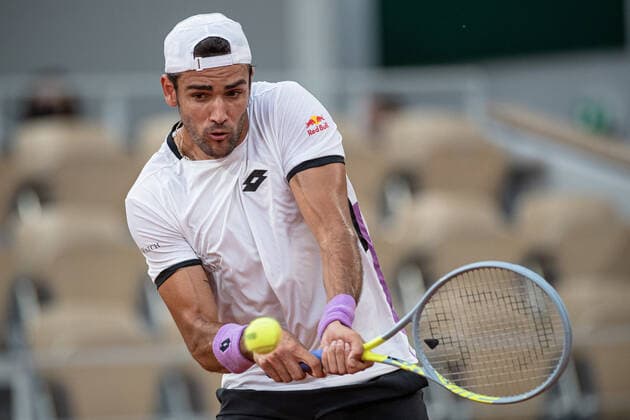 (210610) -- PARIS, June 10, 2021 -- Matteo Berrettini of Italy hits a return during the men s singles quarterfinal against Novak Djokovic of Serbia at the French Open tennis tournament at Roland Garros in Paris, France, June 9, 2021. (Photo by Xinhua) (SP)FRANCE-PARIS-TENNIS-ROLAND GARROS-FRENCH OPEN-MEN S SINGLES-DAY 11 AurelienxMorissard 