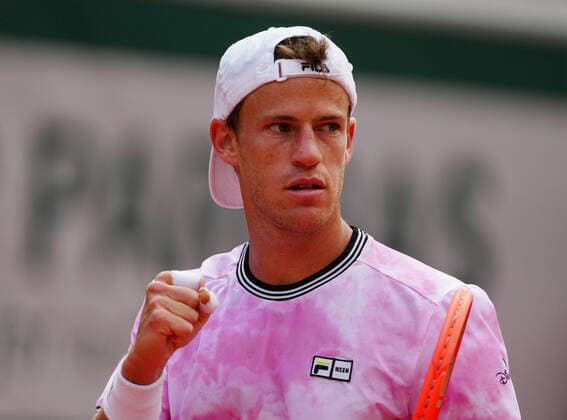 (210610) -- PARIS, June 10, 2021 -- Diego Schwartzman of Argentina reacts during the men s singles quarterfinal against Rafael Nadal of Spain at the French Open tennis tournament at Roland Garros in Paris, France, June 9, 2021. ) (SP)FRANCE-PARIS-TENNIS-ROLAND GARROS-FRENCH OPEN-MEN S SINGLES-DAY 11 GaoxJing 