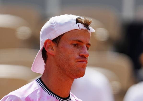 (210610) -- PARIS, June 10, 2021 -- Diego Schwartzman of Argentina reacts during the men s singles quarterfinal against Rafael Nadal of Spain at the French Open tennis tournament at Roland Garros in Paris, France, June 9, 2021. ) (SP)FRANCE-PARIS-TENNIS-ROLAND GARROS-FRENCH OPEN-MEN S SINGLES-DAY 11 GaoxJing 