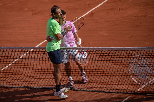 (210610) -- PARIS, June 10, 2021 -- Rafael Nadal (L) of Spain and Diego Schwartzman of Argentina greet each other after their men s singles quarterfinal at the French Open tennis tournament at Roland Garros in Paris, France, June 9, 2021. (Photo by Aurelien Morissard Xinhua) (SP)FRANCE-PARIS-TENNIS-ROLAND GARROS-FRENCH OPEN-MEN S SINGLES-DAY 11 AoxLeilian¡¤molisaer 