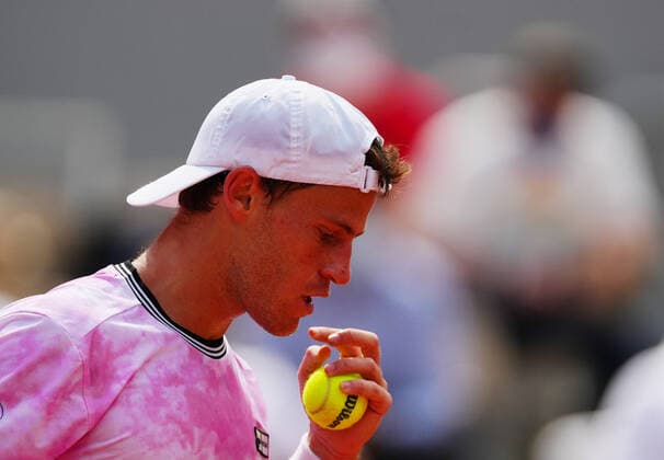 (210610) -- PARIS, June 10, 2021 -- Diego Schwartzman of Argentina reacts during the men s singles quarterfinal against Rafael Nadal of Spain at the French Open tennis tournament at Roland Garros in Paris, France, June 9, 2021. ) (SP)FRANCE-PARIS-TENNIS-ROLAND GARROS-FRENCH OPEN-MEN S SINGLES-DAY 11 GaoxJing 