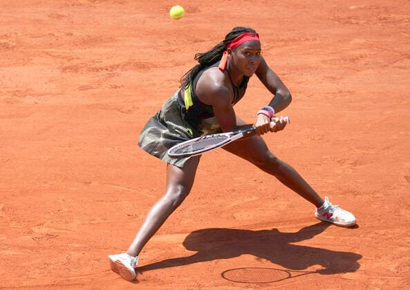 (210610) -- PARIS, June 10, 2021 -- Coco Gauff of the United States returns the ball during the women s singles quarterfinal against Barbora Krejcikova of the Czech Republic at the French Open tennis tournament at Roland Garros in Paris, France, June 9, 2021. ) (SP)FRANCE-PARIS-TENNIS-ROLAND GARROS-FRENCH OPEN-WOMEN S SINGLES-DAY 11 GaoxJing 