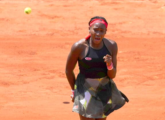 (210610) -- PARIS, June 10, 2021 -- Coco Gauff of the United States reacts during the women s singles quarterfinal against Barbora Krejcikova of the Czech Republic at the French Open tennis tournament at Roland Garros in Paris, France, June 9, 2021. ) (SP)FRANCE-PARIS-TENNIS-ROLAND GARROS-FRENCH OPEN-WOMEN S SINGLES-DAY 11 GaoxJing 