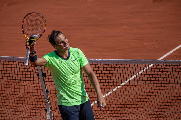 (210610) -- PARIS, June 10, 2021 -- Rafael Nadal of Spain celebrates his victory after the men s singles quarterfinal against Diego Schwartzman of Argentina at the French Open tennis tournament at Roland Garros in Paris, France, June 9, 2021. (Photo by Aurelien Morissard Xinhua) (SP)FRANCE-PARIS-TENNIS-ROLAND GARROS-FRENCH OPEN-MEN S SINGLES-DAY 11 AoxLeilian¡¤molisaer 