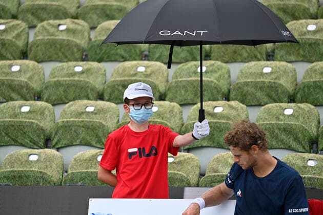 Ball child with glasses holds umbrella Parasol for Yannick Hanfmann GER during break 10 06 2021 Tennis MercedesCup Stuttgart 2021 Weißenhof ATP 07 13 06 2021 Tennis MercedesCup Stuttgart 2021