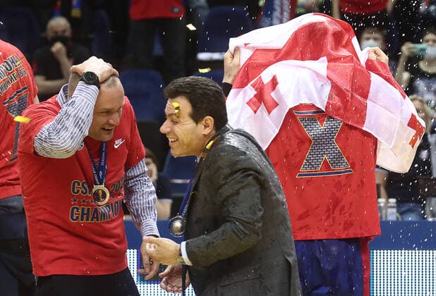 MOSCOW, RUSSIA - JUNE 10, 2021: CSKA Moscow s head coach Dimitrios Itoudis (C front) is sprayed with champagne as CSKA Moscow celebrate winning the VTB United League title after defeating UNICS Kazan 89-81 in Game 3 of the 2021 2022 VTB United League final series at CSKA Arena. Valery Sharifulin TASS  TS1044C9