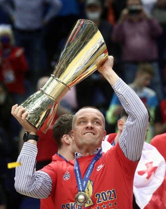 MOSCOW, RUSSIA - JUNE 10, 2021: The President and General Director of PBC CSKA Moscow, Andrei Vatutin poses with the trophy as CSKA Moscow celebrate winning the VTB United League title after defeating UNICS Kazan 89-81 in Game 3 of the 2021 2022 VTB United League final series at CSKA Arena. Valery Sharifulin TASS  TS1044DB