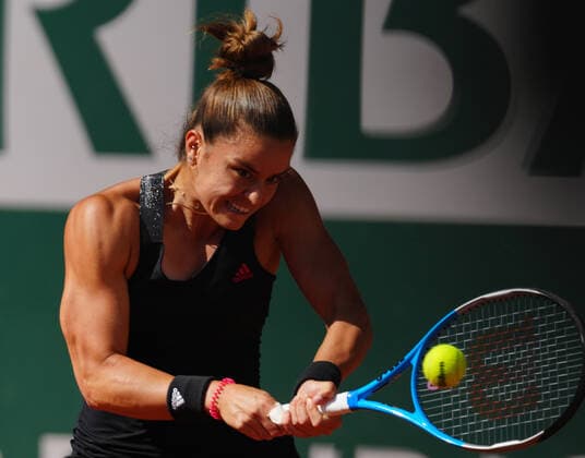(210611) -- PARIS, June 11, 2021 -- Maria Sakkari of Greece hits a return during the women s singles semifinal match between Barbora Krejcikova of the Czech Republic and Maria Sakkari of Greece at the French Open tennis tournament at Roland Garros in Paris, France, June 10, 2021. ) (SP)FRANCE-PARIS-TENNIS-ROLAND GARROS-FRENCH OPEN-WOMEN S SINGLES-SEMIFINALS GaoxJing 