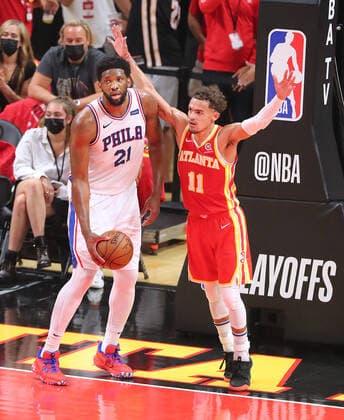 June 11, 2021, Atlanta, GA, USA: The Atlanta Hawks Trae Young (11) scores against the Philadelphia 76ers Joel Embiid as time expires in the first half in Game 3 of their Eastern Conference semifinal at State Farm Arena on Friday, June 11, 2021, in Atlanta. The Sixers won, 127-111, for a 2-1 series lead. Atlanta USA - ZUMAm67_ 0121187663st Copyright: xCurtisxComptonx