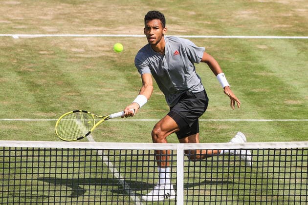 (210612) -- STUTTGART, June 12, 2021 -- Felix Auger-Aliassime returns the ball during the men s singles semifinal of Mercedes Cup between Felix Auger-Aliassime of Canada and Sam Querrey of the United States in Stuttgart, Germany, June 12, 2021. (Photo by Xinhua) (SP)GERMANY-STUTTGART-TENNIS-MERCEDES CUP-MEN S SINGLES-SEMIFINALS PhilippexRuiz 