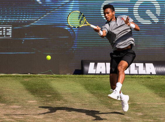 (210612) -- STUTTGART, June 12, 2021 -- Felix Auger-Aliassime returns the ball during the men s singles semifinal of Mercedes Cup between Felix Auger-Aliassime of Canada and Sam Querrey of the United States in Stuttgart, Germany, June 12, 2021. (Photo by Xinhua) (SP)GERMANY-STUTTGART-TENNIS-MERCEDES CUP-MEN S SINGLES-SEMIFINALS PhilippexRuiz 