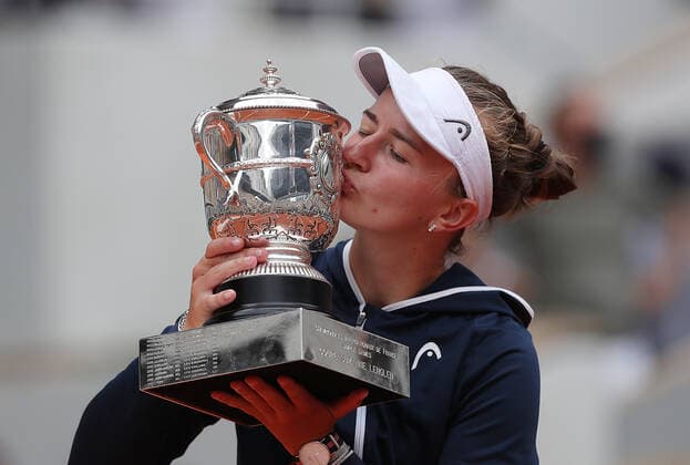(210613) -- PARIS, June 13, 2021 -- Barbora Krejcikova of the Czech Republic kisses the trophy after the women s singles final match between Anastasia Pavlyuchenkova of Russia and Barbora Krejcikova of the Czech Republic at the French Open tennis tournament at Roland Garros in Paris, France, June 12, 2021. ) (SP)FRANCE-PARIS-TENNIS-ROLAND GARROS-FRENCH OPEN-WOMEN S SINGLES-FINALS GaoxJing 