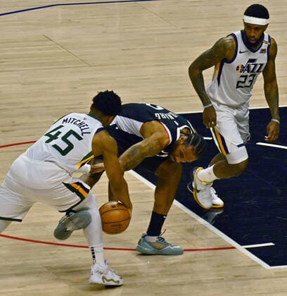 Utah Jazz guard Donovan Mitchell (45) steals the ball from Los Angeles Clippers forward Kawhi Leonard (2) during the first half of Game 3 of the Western Conference second-round playoffs at Staples Center in Los Angeles on Saturday, June 12, 2021. The Clippers rallied to win another game 3, a 132-106 win over the Utah Jazz that cuts their deficit in this second-round series to 2-1 entering Monday s fourth game.  LAP2021061226 JIMxRUYMEN