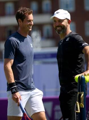 Mandatory Credit: Photo by Ella Ling BPI Shutterstock (12071105y) Andy Murray of Great Britain smiles with coach Jamie Delgado during practice Cinch Championships, Practice, Tennis, Queens Club, London, UK - 13 June 2021 EDITORIAL USE ONLY No use with unauthorised audio, video, data, fixture lists, club league logos or live services. Online in-match use limited to 120 images, no video emulation. No use in betting, games or single club league player publications. Cinch Championships, Practice, Tennis, Queens Club, London, UK - 13 June 2021 EDITORIAL USE ONLY No use with unauthorised audio, video, data, fixture lists, club league logos or live services. Online in-match use limited to 120 images, no video emulation. No use in betting, games or single club league player publications. Copyright: xEllaxLing BPI Shutterstockx 12071105y