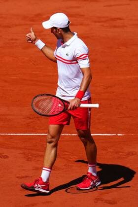 Mandatory Credit: Photo by Javier Garcia BPI Shutterstock (12058233ak) Novak Djokovic gives a sarcastic thumbs-up to his team after losing a game in the Men s Singles final French Open Tennis, Day Fifteen, Roland Garros, Paris, France - 13 Jun 2021 French Open Tennis, Day Fifteen, Roland Garros, Paris, France - 13 Jun 2021  Copyright: xJavierxGarcia BPI Shutterstockx 12058233ak