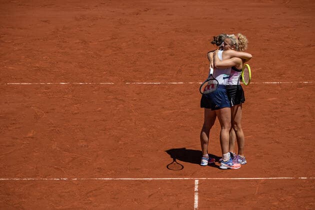 (210613) -- PARIS, June 13, 2021 -- Barbora Krejcikova (L) Katerina Siniakova celebrate after winning the women s doubles final between Barbora Krejcikova Katerina Siniakova of the Czech Republic and Iga Swiatek of Poland Bethanie Mattek-Sands of the United States at the French Open tennis tournament at Roland Garros in Paris, France, June 13, 2021. (Photo by Xinhua) (SP)FRANCE-PARIS-TENNIS-ROLAND GARROS-FRENCH OPEN-WOMEN S DOUBLES-FINAL AurelienxMorissard 