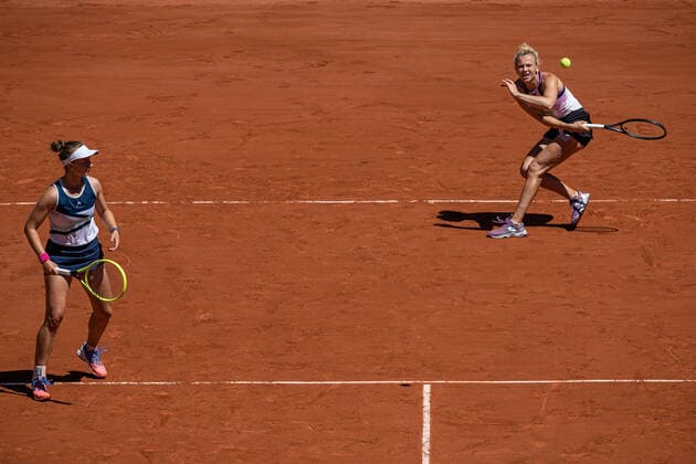 (210613) -- PARIS, June 13, 2021 -- Barbora Krejcikova (L) Katerina Siniakova compete during the women s doubles final between Barbora Krejcikova Katerina Siniakova of the Czech Republic and Iga Swiatek of Poland Bethanie Mattek-Sands of the United States at the French Open tennis tournament at Roland Garros in Paris, France, June 13, 2021. (Photo by Xinhua) (SP)FRANCE-PARIS-TENNIS-ROLAND GARROS-FRENCH OPEN-WOMEN S DOUBLES-FINAL AurelienxMorissard 