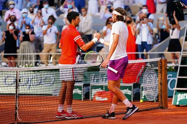 Mandatory Credit: Photo by Javier Garcia BPI Shutterstock (12058233jf) Novak Djokovic celebrates winning the Men s Singles final and is congratulated by Stefanos Tsitsipas French Open Tennis, Day Fifteen, Roland Garros, Paris, France - 13 Jun 2021 French Open Tennis, Day Fifteen, Roland Garros, Paris, France - 13 Jun 2021  Copyright: xJavierxGarcia BPI Shutterstockx 12058233jf
