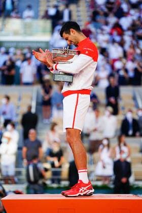 Mandatory Credit: Photo by Javier Garcia BPI Shutterstock (12058233jw) Novak Djokovic celebrates with the Musketeers Trophy after winning the Men s Singles final French Open Tennis, Day Fifteen, Roland Garros, Paris, France - 13 Jun 2021 French Open Tennis, Day Fifteen, Roland Garros, Paris, France - 13 Jun 2021  Copyright: xJavierxGarcia BPI Shutterstockx 12058233jw