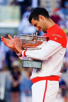 Mandatory Credit: Photo by Javier Garcia BPI Shutterstock (12058233jv) Novak Djokovic celebrates with the Musketeers Trophy after winning the Men s Singles final French Open Tennis, Day Fifteen, Roland Garros, Paris, France - 13 Jun 2021 French Open Tennis, Day Fifteen, Roland Garros, Paris, France - 13 Jun 2021  Copyright: xJavierxGarcia BPI Shutterstockx 12058233jv